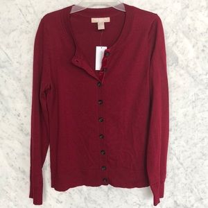Maroon cardigan with velvet lining along buttons